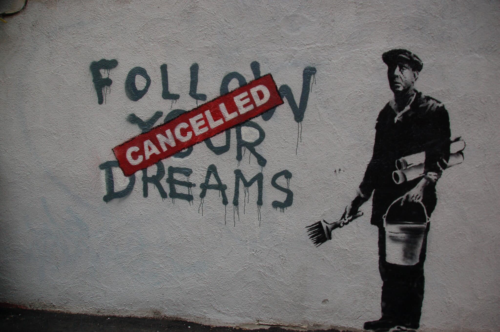 Graffiti "Follow your dreams cancelled" par Banksy