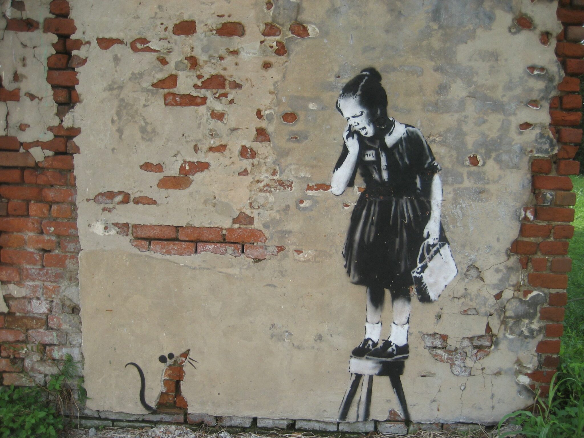 Graffiti "La petite fille et le rat" par Banksy